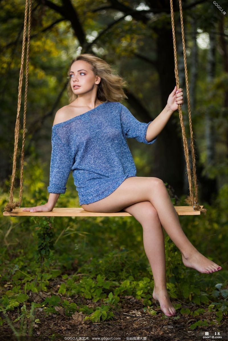Photo of beauty LYDIAJ swinging in the woods