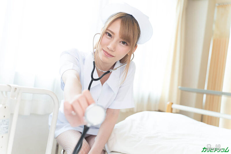 The slutty Japanese nurse Ruzuki undresses the patient and fucks her with her fingers